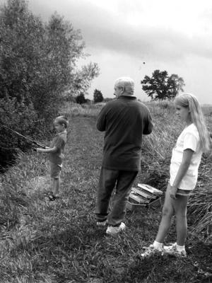 Grampa and his grandchildren fishing... By: C. Thibodeau