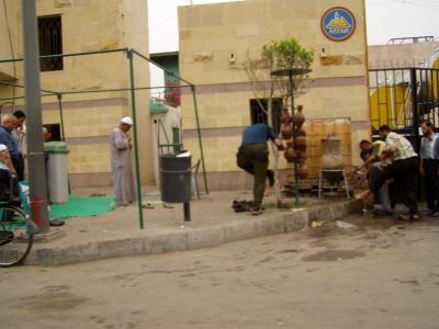 Street mosque-prayer preparations.JPG