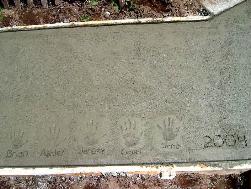 Grandkids in wet cement.jpg