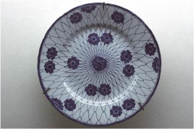 Porcelain with fish net motive