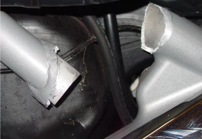 Broken trike rear frame member caused from an accident impact