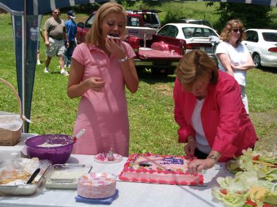 Birthday girl eating Bday cake & mom