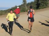 Scott eats while Leah holds new bottles & pack and Glenn runs back to recover the old bottles & pack