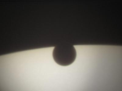 I assumne that the sunlight is refracted in the venus atmosphere.