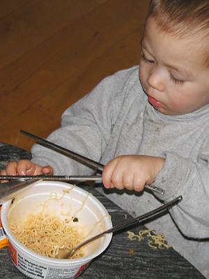 oliver eats noodles.jpg