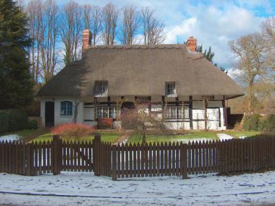 An English Thatched Cottage.