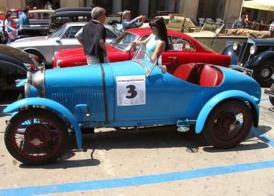 A parade of antique cars