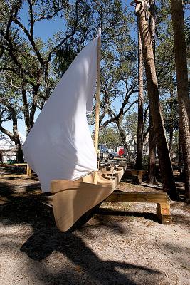 dugout canoe with sail