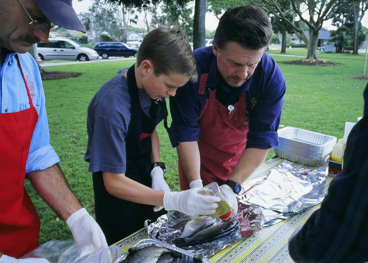 Mr. Stroman, Alex and Mr. Jones on the production line