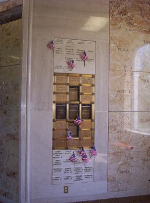 Wall where Luman's first wife has a drawer.