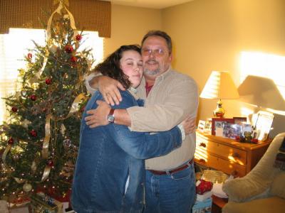 abby and her daddy hug christmas 2003