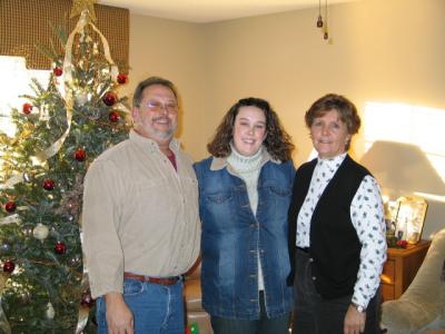 Abby's dad, Abby, and  Pat family christmas photo
