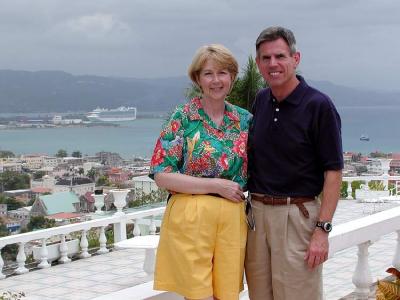 The Happy Cruisers with the ship in Montego Bay in the background.