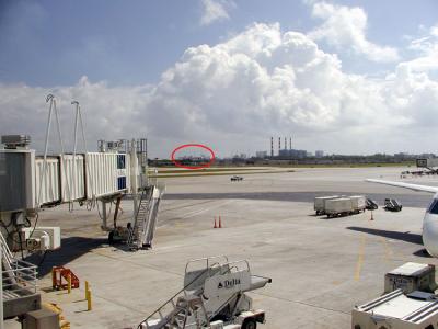 You can see the Caribbean Princess (in red oval) from the airport terminal.