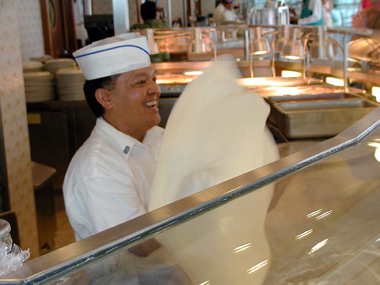 Delicious hand-made pizzas all day long at Pregos next to pool.