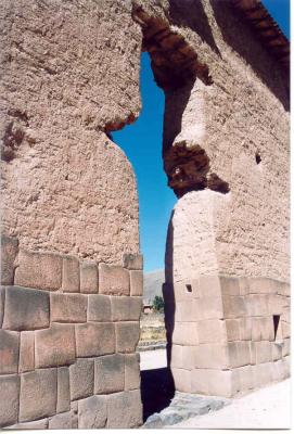 The central wall is adobe above and Inca masonry below