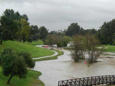 Normally, a  tiny natural stream runs through the golf course between the two trees where you see the one red x