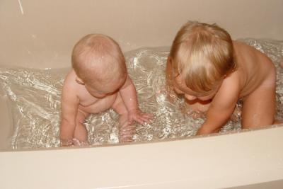 Rory teaching Clara how to splash