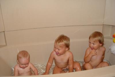Rory and Reagan watching thier little buddy splash like a pro