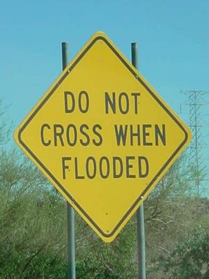 leaving the flying field <br> Do Not Cross <br> When Flooded