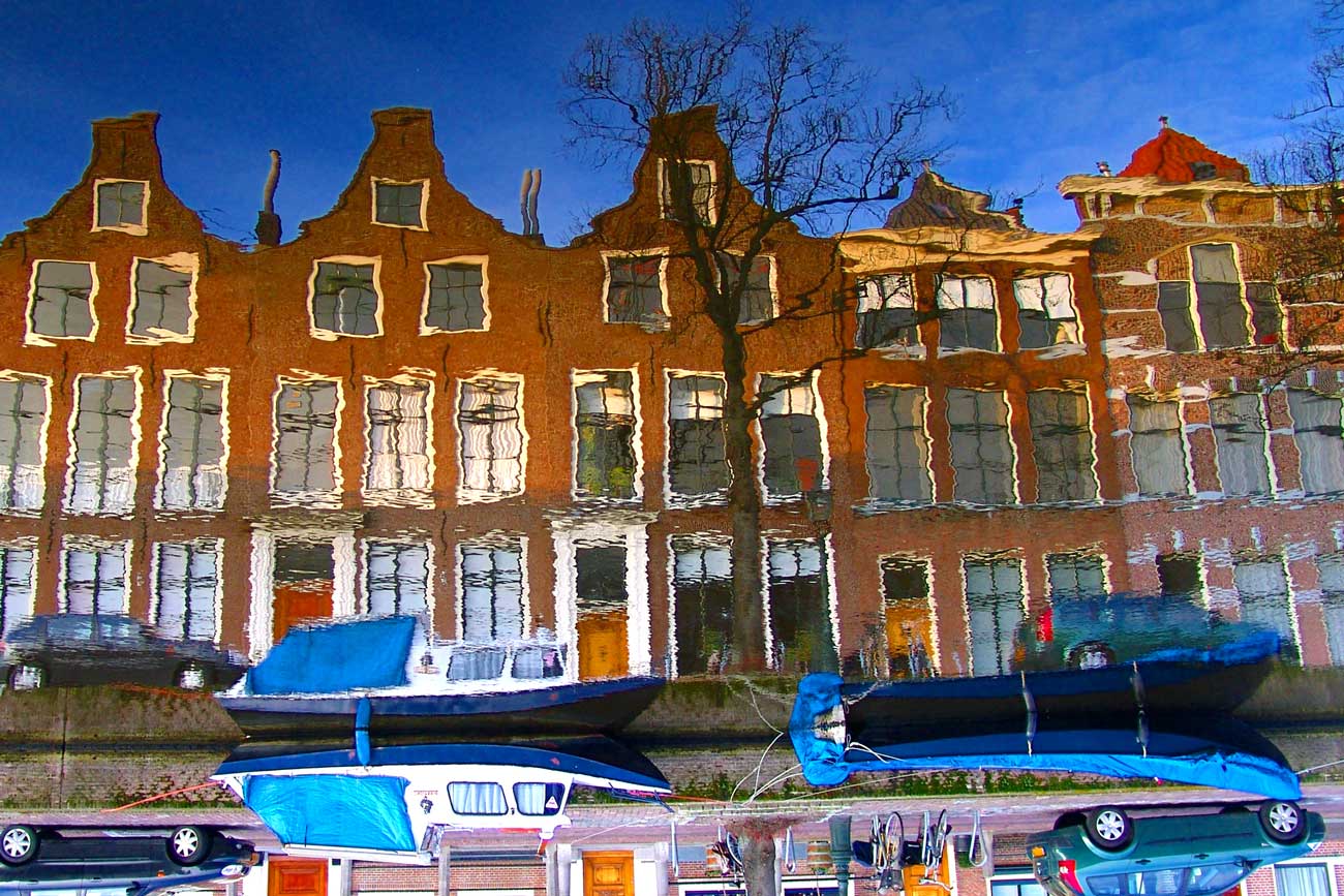 Blue boats reflect