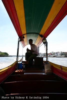 A Chao Praya boatman taking us back to our hotel