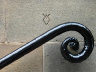 A mason's mark on a wall of the castle.