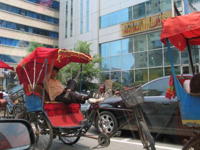 Bicycle Rickshaw Man Resting