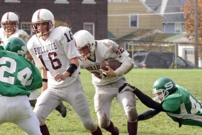 Jim Kvassay making a tackle