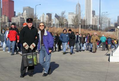 Dad and Helen walking to the Bears game, Chicago