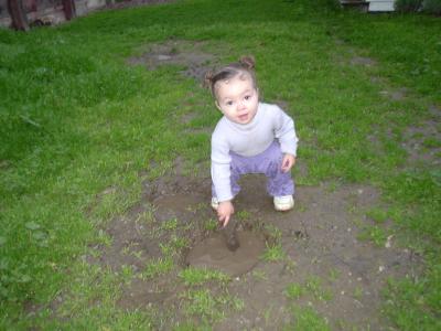 Leila playing in the mud