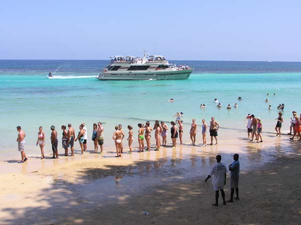Line of people waiting to climb Dunns River Falls