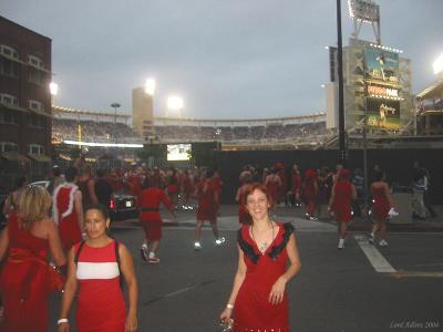 Christine with a Padres Baseball game in the backgroud