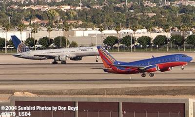 Continental Airlines B757-224 and Southwest Airlines B737-7H4 N463WN aviation stock photo #0879