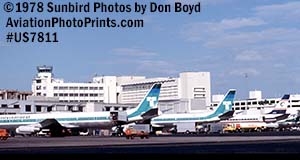 Trans International DC8-63CF's, 1 Capitol lnternational DC8 and 1 Ozark DC9 aviation stock photo #US7811