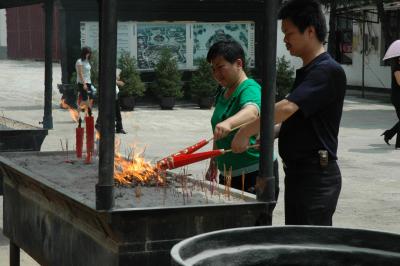 Burning Incense Inside the Guiyuan Buddhist Temple