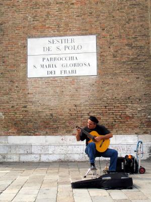 A performer outside one of the many churches