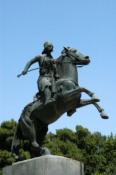 Equestrian statue of famous dead Greek near stadium