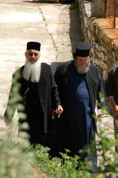 Orthodox priests at Ossios Loukas