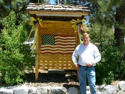 Tom with Veterans Memorial