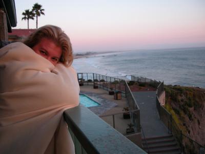 Laurie warming up on the balcony at Pismo Beach, CA