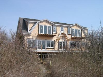 Here is a house near a rocky beach we go to, to watch the sunsets.  Was all woods here, now a house, oh well, thats 'progress'.
I am standing on the cliff looking back.