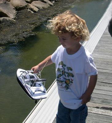 Max and his electric boat, 2004