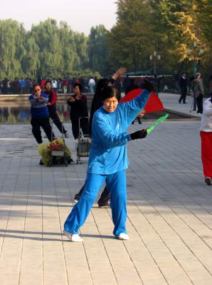 Early sunday morning exercise in a park in Beijing