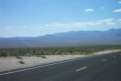 The dirt road to the left leads to Groom Lake and Area 51, is heavily guarded by men with guns and closed to public