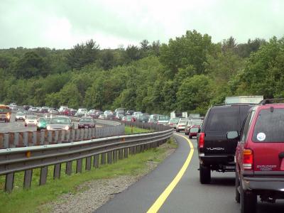 A working we shall go!  This is typical morning rush (?) hour traffic on Route 128 South (I-95 South) in Lexington, MA just outside of Boston. Ya gotta love it!

All I can say is, what is this going to be like during the Democratic National Convention when they completely shut down all major highways into Boston!  Yikes!