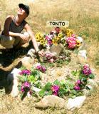 Leah lays flowers on Tontos grave