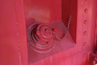 The filler cap for a tank on a caboose - but I don't know what the tank is supposed to hold unless it is fuel for the heater inside the caboose.