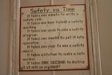An old, undated safety sign posted in the roundhouse workshops.