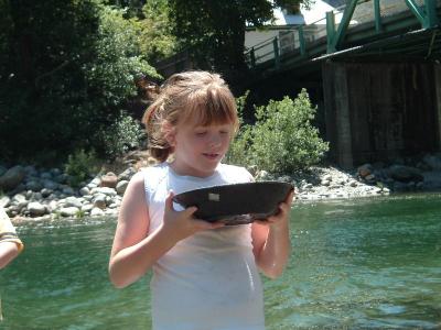 Shelby pans for gold in the Yuba river.